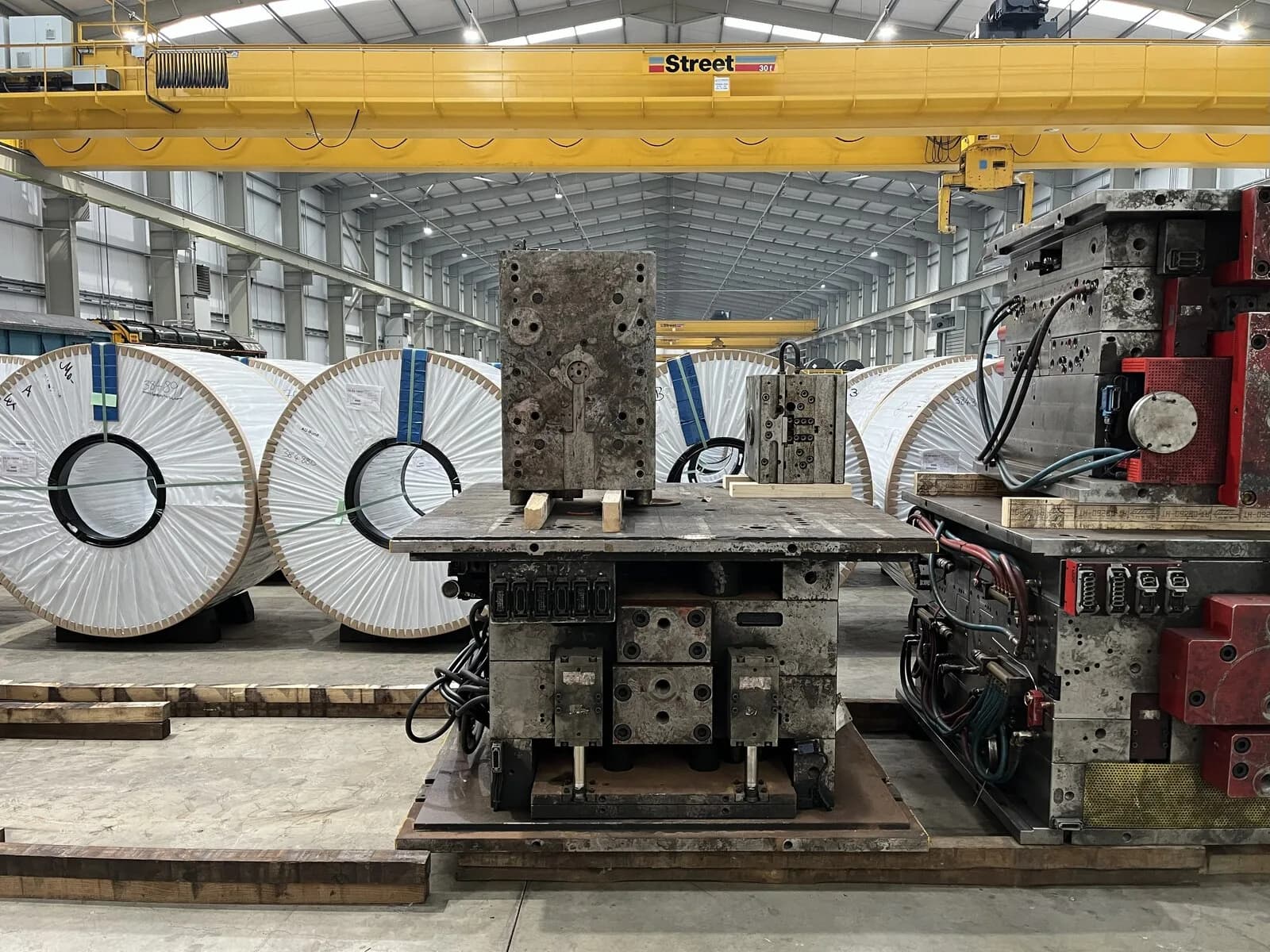 Steel coils staged in a processing facility